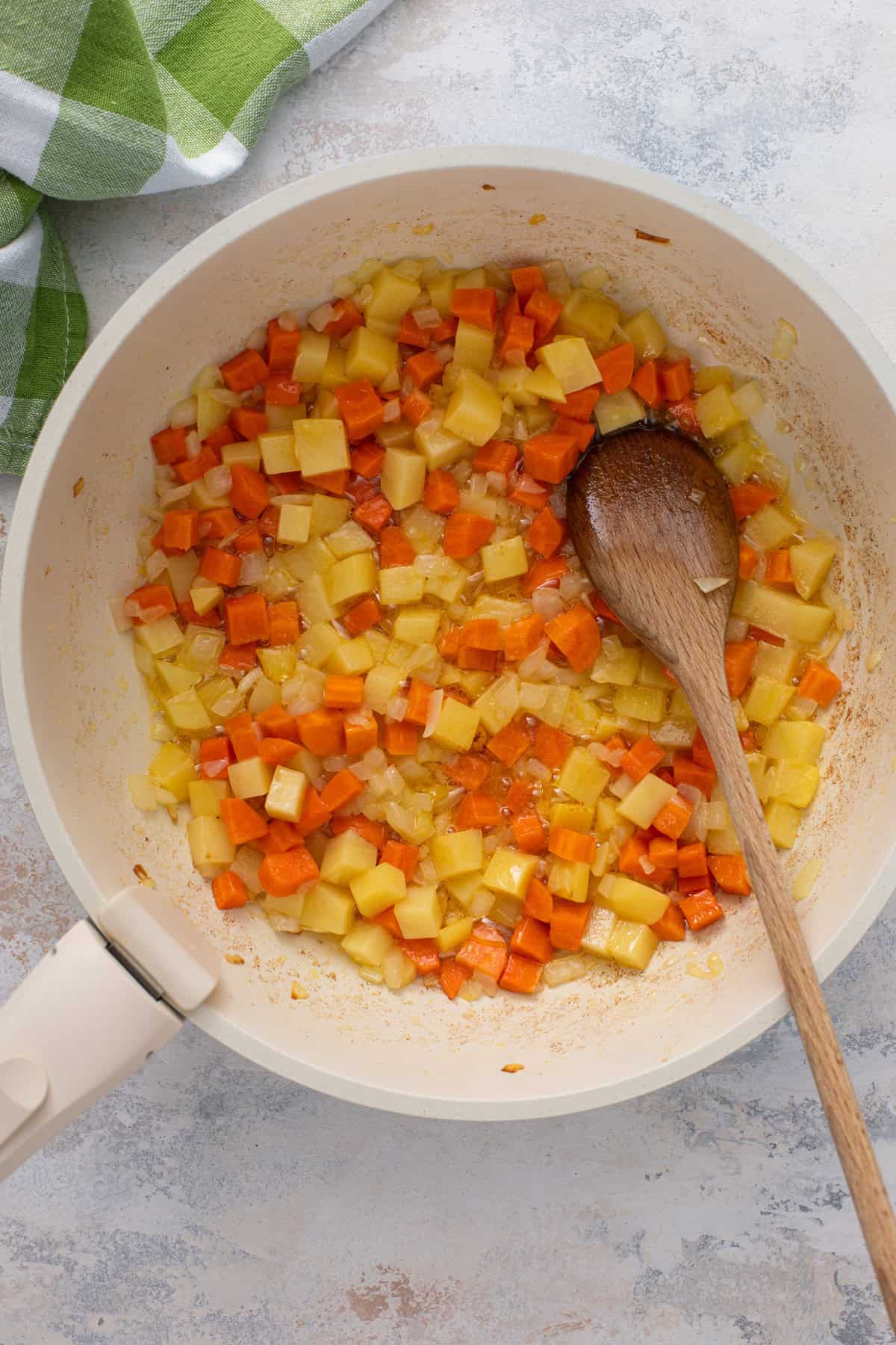 Sauteeing vegetables in a skillet.