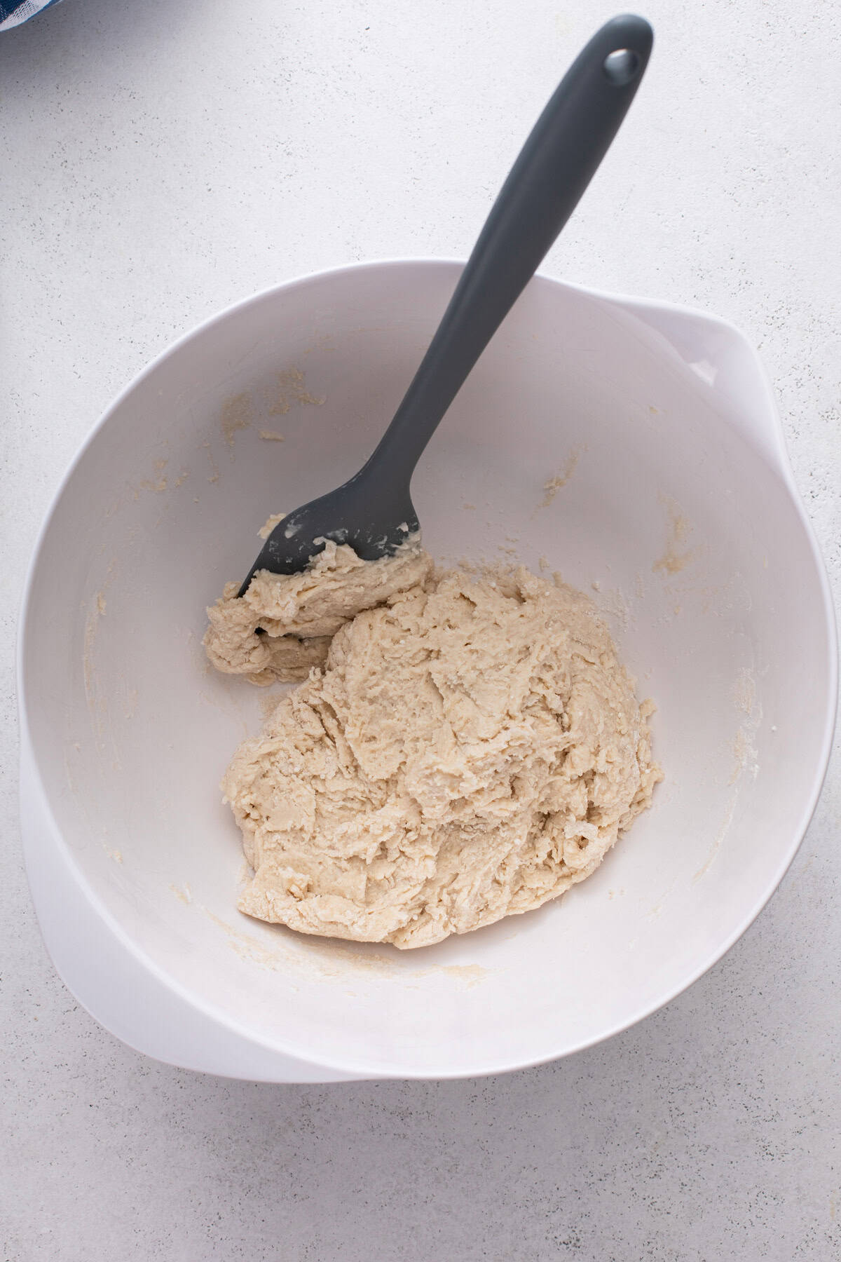 Biscuit dough mixed in a bowl.