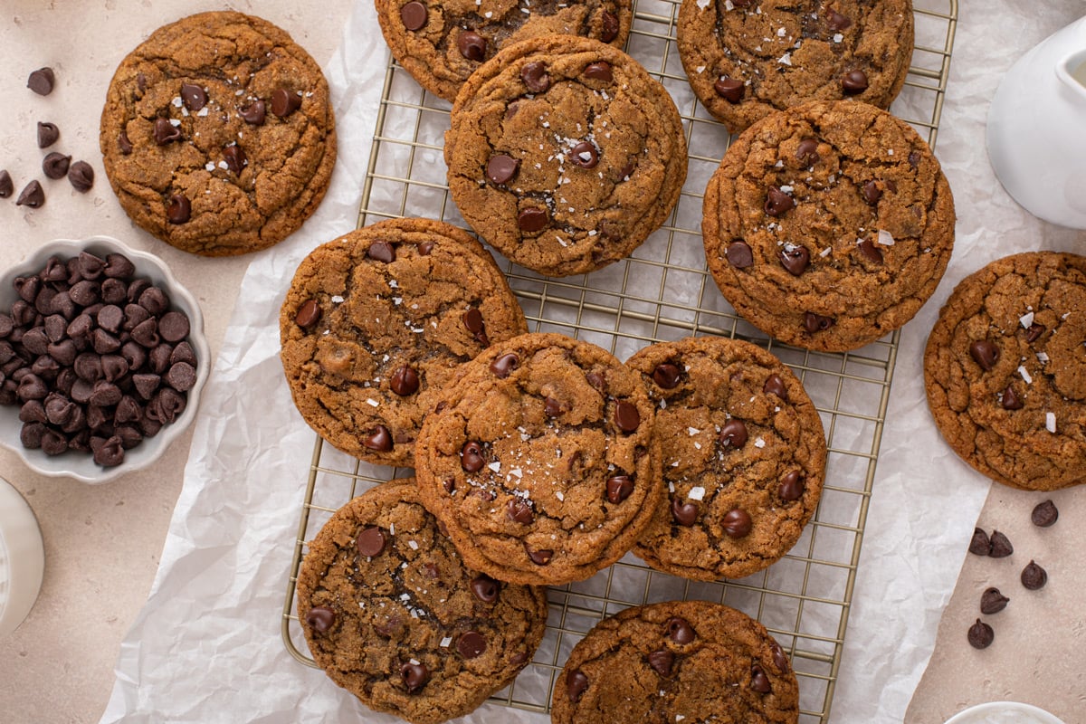 Overhead view of espresso chocolate chip cookies cooling on a wire rack.